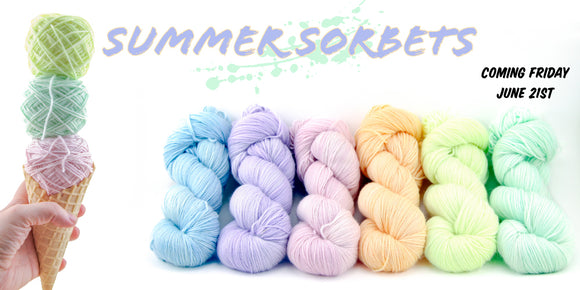 A waffle cone is on the left with three wound up mini skeins in pastel colours yellow, green, and pink. To the right are six skeins of pastel yarn in rainbow order. Above them is a banner that says Summer Sorbets coming Friday June 21st